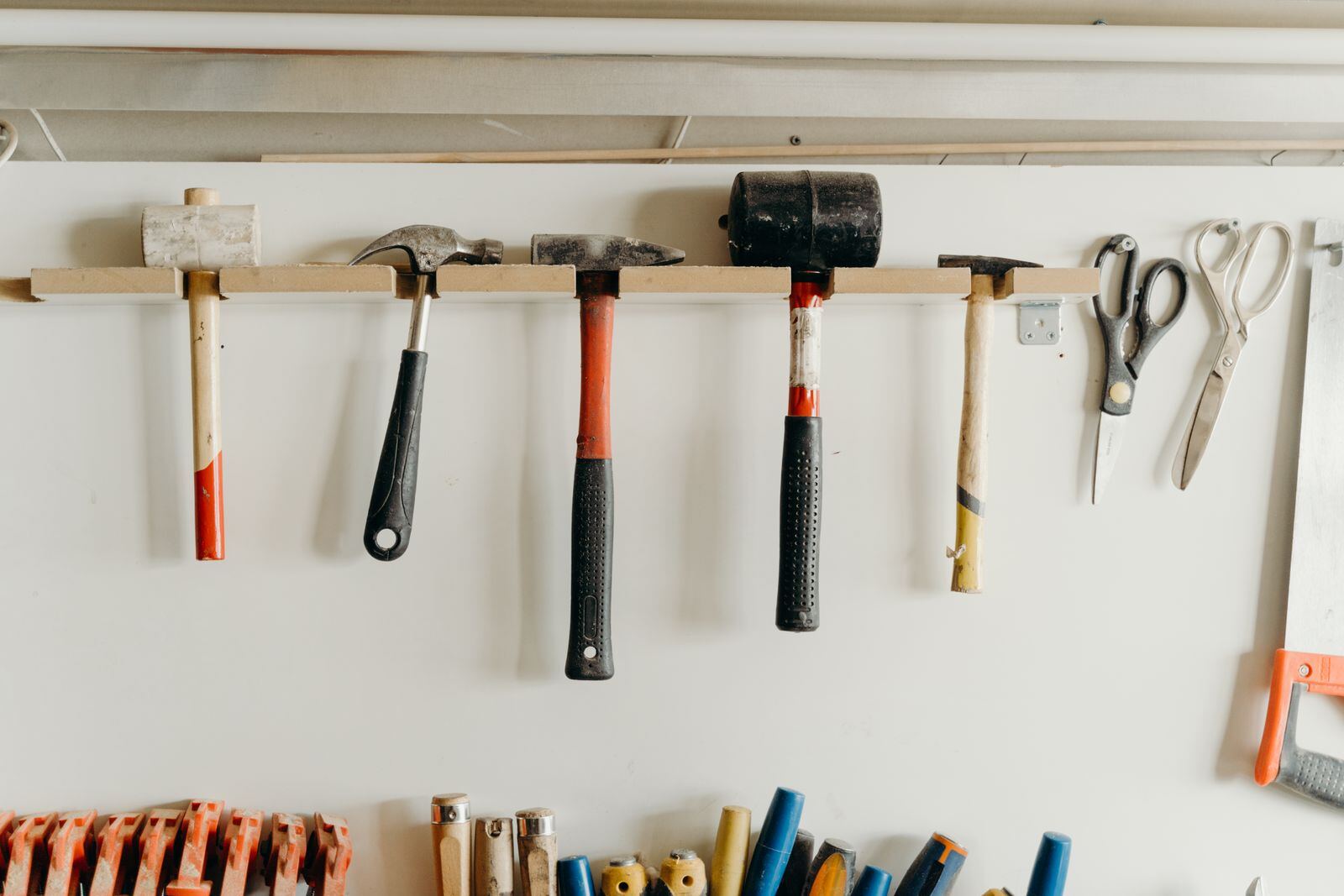 Hammer and Mallets Hanging on the Wall